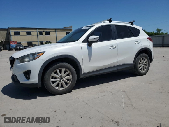 2015 Mazda CX-5 Touring with VIN JM3KE2CY5F0548826, listed as a Copart auction lot 52686565 with 139,602 mi miles and Salvage Title. Bid and sale history available at carsss.com. Image 1.