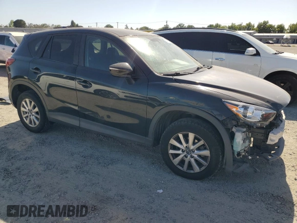 2016 Mazda CX-5 Touring z VIN JM3KE2CY5G0617516, wystawiony jako Copart lot #56421005 z przebiegiem 110 739 mil mil oraz Szkoda całkowita • Salvage title. Historia ofert i sprzedaży dostępna na DreamBid. Obrazek 4.