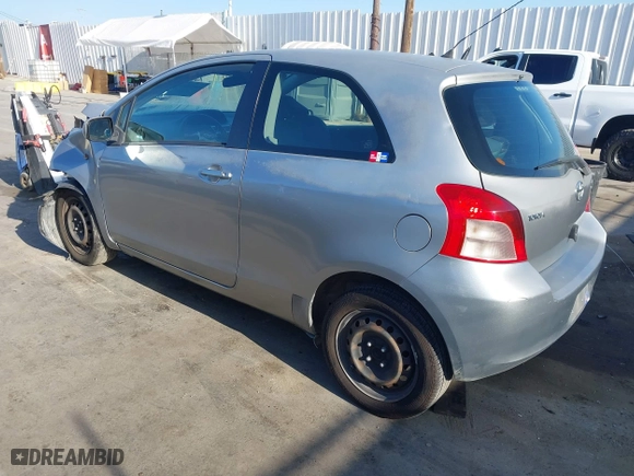 2008 Toyota Yaris with VIN JTDJT923885191561, listed as a IAAI auction lot 42018083 with 228,090 mi miles. Bid and sale history available at carsss.com. Image 3.