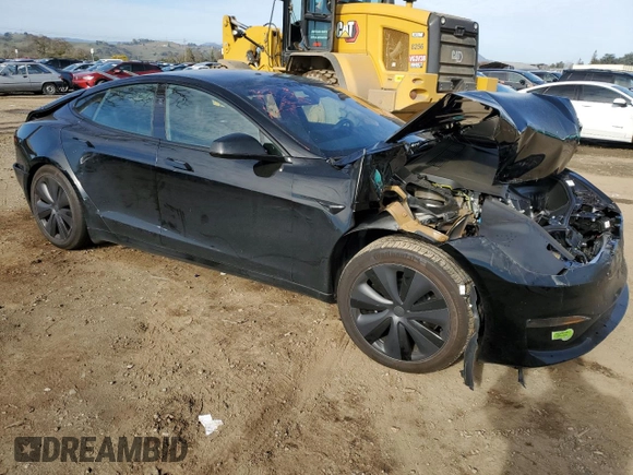 2023 Tesla Model S with VIN 5YJSA1E57PF507456, listed as a Copart auction lot 44649945 with 8,760 mi miles and Salvage title. Bid and sale history available at DreamBid. Image 4.
