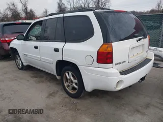2005 GMC Envoy SLT with VIN 1GKDT13S952190876, listed as a IAAI auction lot 41308686 with 244,774 mi miles. Bid and sale history available at carsss.com. Image 3.