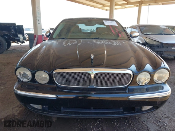 2005 Jaguar XJ Vanden Plas z VIN SAJWA82C05SG47589, wystawiony jako IAAI lot #42409697 z przebiegiem 222 598 mil mil oraz . Historia ofert i sprzedaży dostępna na DreamBid. Obrazek 12.