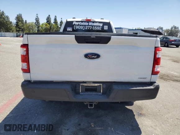 2023 Ford F-150 XL with VIN 1FTEX1CP5PKG20325, listed as a Copart auction lot 58496325 with 31,182 mi miles and Salvage title. Bid and sale history available at DreamBid. Image 6.