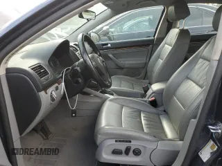 2005 Volkswagen Jetta 2.5L with VIN 3VWDG71K65M606300, listed as a Copart auction lot 57848515 with 108,928 mi miles and Salvage title. Bid and sale history available at DreamBid. Image 7.
