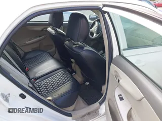 2010 Toyota Corolla with VIN 2T1BU4EE1AC312151, listed as a IAAI auction lot 42761709 with 121,356 mi miles and . Bid and sale history available at DreamBid. Image 8.