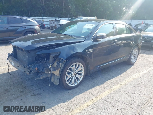 2014 Ford Taurus Limited with VIN 1FAHP2F86EG163392, listed as a IAAI auction lot 42538336 with 131,910 mi miles and . Bid and sale history available at DreamBid. Image 18.