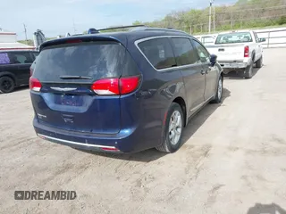 2018 Chrysler Pacifica Touring L Plus with VIN 2C4RC1EGXJR115464, listed as a IAAI auction lot 42013816 with 129,881 mi miles and . Bid and sale history available at DreamBid. Image 4.
