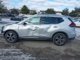 2018 Nissan Rogue S with VIN 5N1AT2MT2JC738034, listed as a IAAI auction lot 41286839 with 125,037 mi miles and . Bid and sale history available at DreamBid. Image 14.