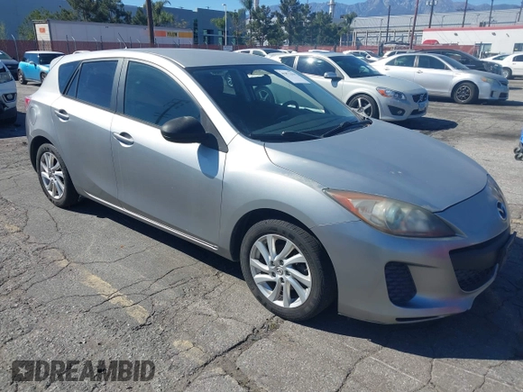 2012 Mazda Mazda3 i Touring with VIN JM1BL1L87C1609141, listed as a IAAI auction lot 41871418 with 125,253 mi miles. Bid and sale history available at carsss.com. Image 1.