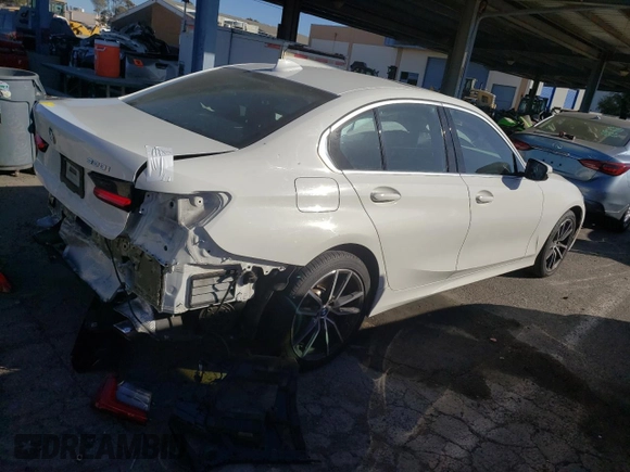 2020 BMW 3 Series 330i with VIN WBA5R1C02LFH48666, listed as a Copart auction lot 67959402 with 57,074 mi miles. Bid and sale history available at carsss.com. Image 3.