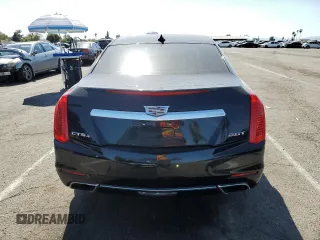 2015 Cadillac CTS Luxury AWD z VIN 1G6AX5SX3F0114674, wystawiony jako Copart lot #53913865 z przebiegiem 103 959 mil mil oraz Szkoda całkowita • Salvage title. Historia ofert i sprzedaży dostępna na DreamBid. Obrazek 6.