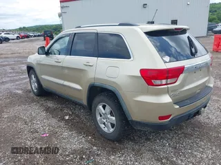 2011 Jeep Grand Cherokee Laredo with VIN 1J4RR4GG8BC558018, listed as a IAAI auction lot 42347367 with 180,334 mi miles and . Bid and sale history available at DreamBid. Image 3.