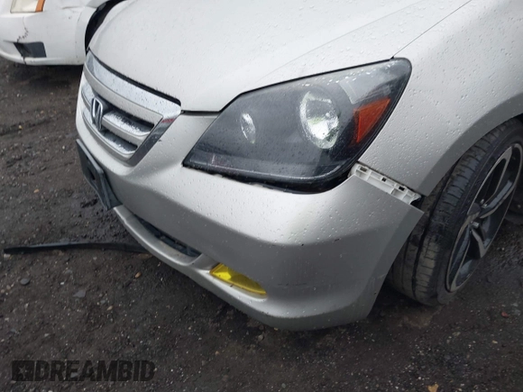 2005 Honda Odyssey EX-L with VIN 5FNRL38645B417008, listed as a IAAI auction lot 41870386 with Not Provided miles and . Bid and sale history available at carsss.com. Image 6.
