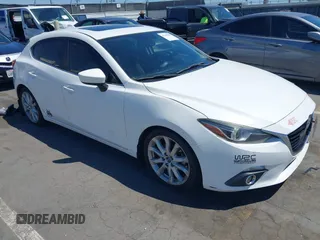 2015 Mazda 3 S Grand Touring with VIN JM1BM1M39F1233093, listed as a IAAI auction lot 42245609 with 137,487 mi miles and . Bid and sale history available at DreamBid. Image 1.
