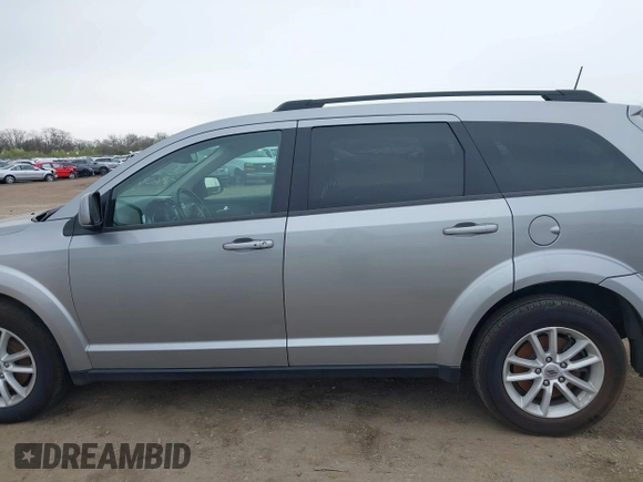 2019 Dodge Journey SE with VIN 3C4PDCBBXKT810874, listed as a IAAI auction lot 41960889 with 170,441 mi miles and . Bid and sale history available at DreamBid. Image 14.