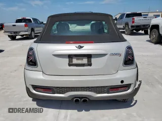 2013 MINI Convertible S с VIN WMWZP3C57DT705259, выставлен на аукционе Copart как лот 59954795 с пробегом 132 988 миль миль и Списание • Salvage title. История ставок и продаж доступна на DreamBid. Изображение 6.