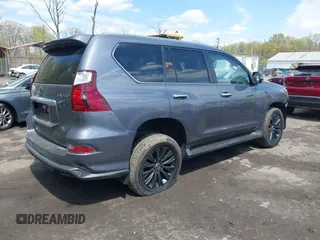 2022 Lexus GX with VIN JTJGM7BX5N5309119, listed as a IAAI auction lot 42036991 with 34,320 mi miles. Bid and sale history available at carsss.com. Image 4.