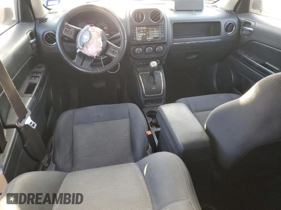 2015 Jeep Patriot Latitude with VIN 1C4NJPFB4FD298011, listed as a Copart auction lot 52152845 with 95,101 mi miles and Salvage Title. Bid and sale history available at DreamBid. Image 8.