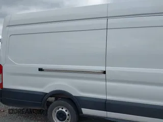 2022 Ford Transit Cargo with VIN 1FTBR3X85NKA74408, listed as a IAAI auction lot 42150248 with 88,887 mi miles and . Bid and sale history available at DreamBid. Image 6.
