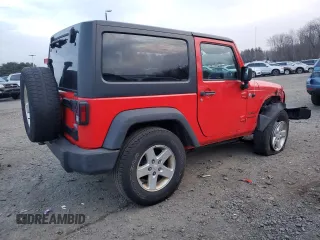 2015 Jeep Wrangler Willys Wheeler with VIN 1C4AJWAG9FL543998, listed as a Copart auction lot 88947025 with 142,433 mi miles and Salvage title. Bid and sale history available at DreamBid. Image 3.