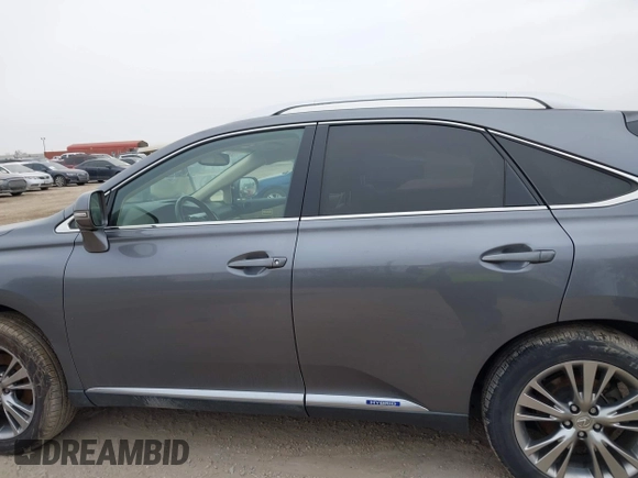 2013 Lexus RX 450h with VIN JTJBC1BA0D2440528, listed as a IAAI auction lot 41591177 with 156,869 mi miles and . Bid and sale history available at DreamBid. Image 14.