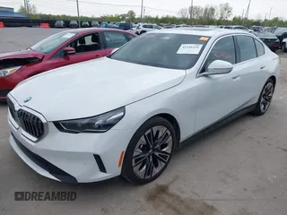 2024 BMW 5 Series 530i xDrive with VIN WBA53FJ03RCS25603, listed as a IAAI auction lot 42141231 with Not provided miles and . Bid and sale history available at DreamBid. Image 2.