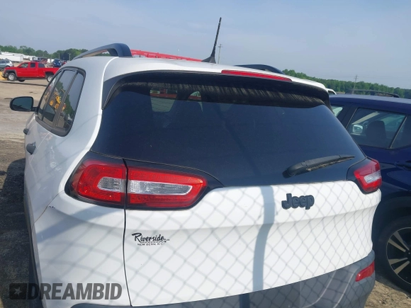 2016 Jeep Cherokee Altitude with VIN 1C4PJLABXGW323881, listed as a IAAI auction lot 42289189 with 147,631 mi miles and . Bid and sale history available at DreamBid. Image 16.