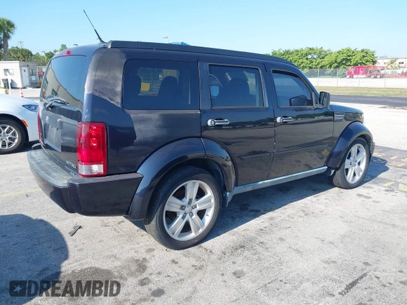 2011 Dodge Nitro Heat z VIN 1D4PT4GK9BW554273, wystawiony jako IAAI lot #42333126 z przebiegiem 75 533 mil mil oraz . Historia ofert i sprzedaży dostępna na DreamBid. Obrazek 4.