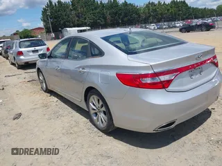 2014 Hyundai Azera Limited z VIN KMHFH4JG9EA397338, wystawiony jako IAAI lot #42352208 z przebiegiem 90 253 mil mil oraz . Historia ofert i sprzedaży dostępna na DreamBid. Obrazek 3.
