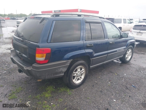 2002 Jeep Grand Cherokee Laredo with VIN 1J4GW48S22C244433, listed as a IAAI auction lot 41892912 with 256,393 mi miles. Bid and sale history available at carsss.com. Image 4.