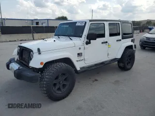 2013 Jeep Wrangler Unlimited Sahara with VIN 1C4BJWEG4DL536694, listed as a Copart auction lot 57714035 with 146,257 mi miles and Salvage title. Bid and sale history available at DreamBid. Image 1.