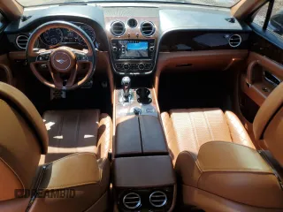 2017 Bentley Bentayga W12 z VIN SJAAC2ZV2HC014547, wystawiony jako Copart lot #57488755 z przebiegiem 63 359 mil mil oraz Tytuł czysty. Historia ofert i sprzedaży dostępna na DreamBid. Obrazek 8.