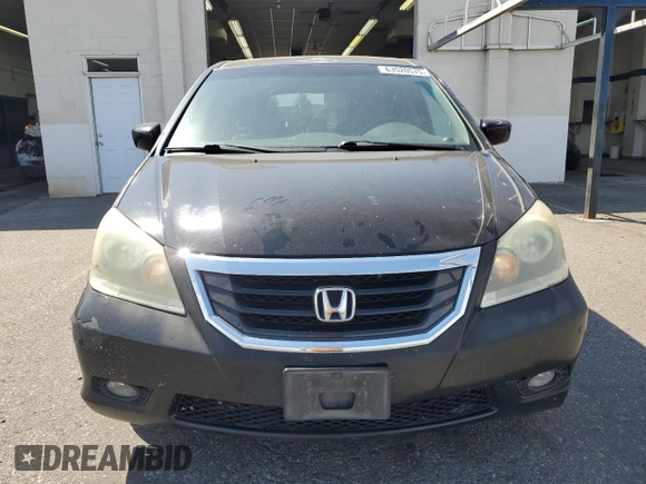 2010 Honda Odyssey Touring with VIN 5FNRL3H9XAB067890, listed as a Copart auction lot 63520575 with 213,582 mi miles and Clean title. Bid and sale history available at DreamBid. Image 5.