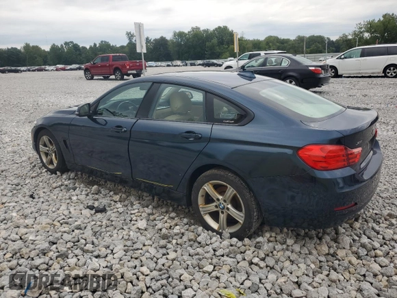 2015 BMW 4 Series 428i xDrive with VIN WBA4C9C57FD330687, listed as a Copart auction lot 67639034 with 114,779 mi miles and Salvage title. Bid and sale history available at DreamBid. Image 2.