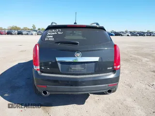 2015 Cadillac SRX with VIN 3GYFNAE30FS573125, listed as a IAAI auction lot 40972187 with 122,612 mi miles and . Bid and sale history available at DreamBid. Image 16.