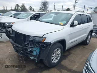 2018 Jeep Grand Cherokee Laredo E with VIN 1C4RJEAG2JC402812, listed as a IAAI auction lot 41439871 with 114,535 mi miles. Bid and sale history available at carsss.com. Image 2.