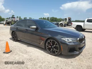 2022 BMW 5 Series M550i xDrive z VIN WBA13BK09NCJ00508, wystawiony jako Copart lot #58077634 z przebiegiem Nie podano mil oraz . Historia ofert i sprzedaży dostępna na DreamBid. Obrazek 4.