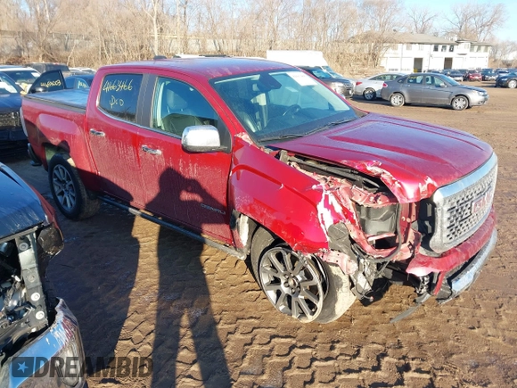 2019 GMC Canyon 4WD Denali with VIN 1GTG6EEN1K1123933, listed as a IAAI auction lot 41663466 with 69,654 mi miles. Bid and sale history available at carsss.com. Image 1.
