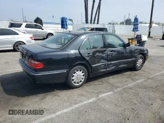 2002 Mercedes-Benz E-Class with VIN WDBJF82JX2X064384, listed as a Copart auction lot 53058325 with 188,440 mi miles and Salvage Title. Bid and sale history available at carsss.com. Image 3.