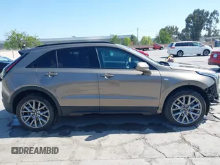 2020 Cadillac XT4 FWD Sport with VIN 1GYFZER4XLF032646, listed as a IAAI auction lot 42078928 with 11,987 mi miles and . Bid and sale history available at DreamBid. Image 14.