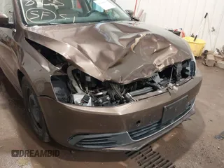 2014 Volkswagen Jetta TDI w/Premium with VIN 3VWLL7AJ1EM358214, listed as a IAAI auction lot 42148435 with 174,923 mi miles and . Bid and sale history available at DreamBid. Image 6.