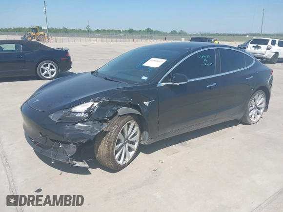 2019 Tesla Model 3 Mid Range z VIN 5YJ3E1EA3KF310976, wystawiony jako IAAI lot #41968012 z przebiegiem Nie podano mil oraz . Historia ofert i sprzedaży dostępna na DreamBid. Obrazek 18.