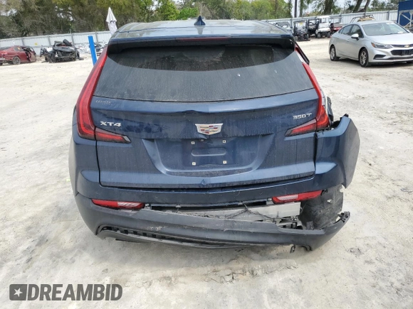2022 Cadillac XT4 FWD Luxury z VIN 1GYAZAR47NF120348, wystawiony jako Copart lot #50187025 z przebiegiem 76 886 mil mil oraz Nie do naprawy • Non repairable. Historia ofert i sprzedaży dostępna na DreamBid. Obrazek 6.