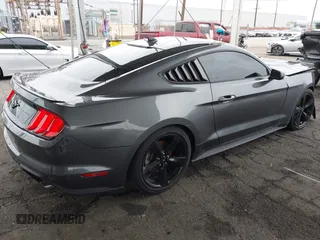 2022 Ford Mustang EcoBoost with VIN 1FA6P8TH5N5142558, listed as a IAAI auction lot 42025156 with 24,069 mi miles and . Bid and sale history available at DreamBid. Image 4.
