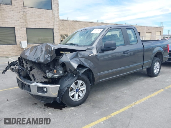 2015 Ford F-150 XL with VIN 1FTEX1CF7FKE65881, listed as a IAAI auction lot 42809438 with 122,541 mi miles and . Bid and sale history available at DreamBid. Image 2.