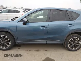 2016 Mazda CX-5 Grand Touring with VIN JM3KE2DY7G0875678, listed as a IAAI auction lot 42104888 with 30,566 mi miles. Bid and sale history available at carsss.com. Image 15.