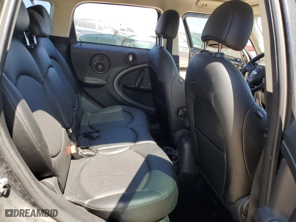 2016 MINI Cooper Countryman S with VIN WMWZC3C51GWT10301, listed as a Copart auction lot 48598885 with 59,465 mi miles and Salvage Title. Bid and sale history available at carsss.com. Image 10.