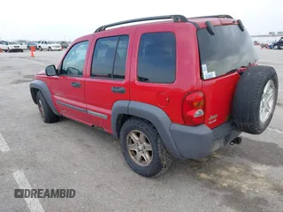 2003 Jeep Liberty Sport with VIN 1J4GL48K03W608325, listed as a IAAI auction lot 42033270 with 210,609 mi miles. Bid and sale history available at carsss.com. Image 3.
