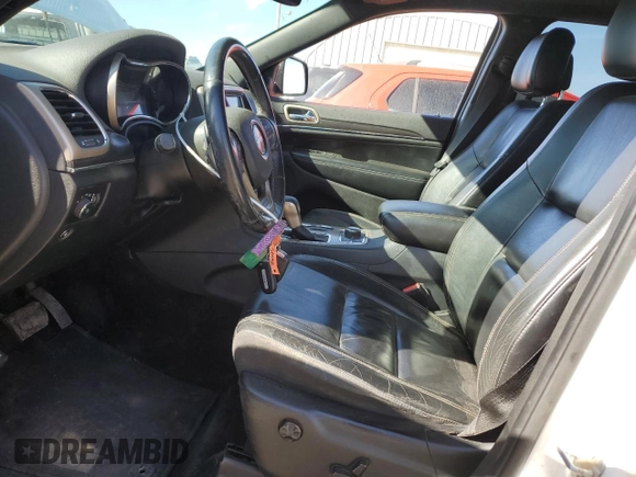 2017 Jeep Grand Cherokee Limited 75th Anniversary with VIN 1C4RJFBT0HC893988, listed as a Copart auction lot 49894675 with 96,226 mi miles and Salvage title. Bid and sale history available at DreamBid. Image 7.