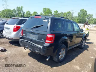 2011 Ford Escape XLT z VIN 1FMCU9DG6BKB21924, wystawiony jako IAAI lot #42645085 z przebiegiem 305 186 mil mil oraz . Historia ofert i sprzedaży dostępna na DreamBid. Obrazek 4.